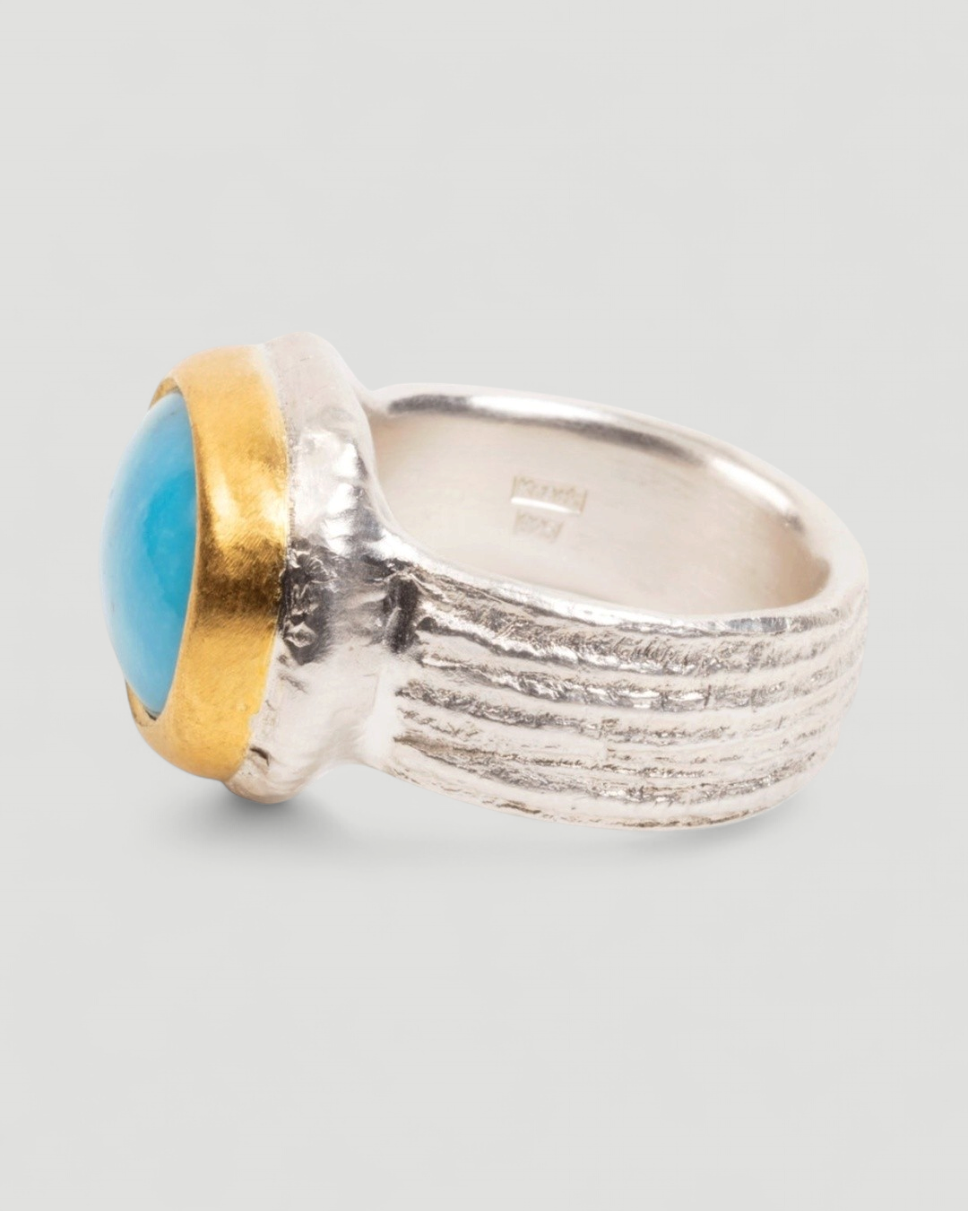 925 Silberring mit ovalem Türkis-Cabochon und Feingoldfassung - Goldschmiede Krack