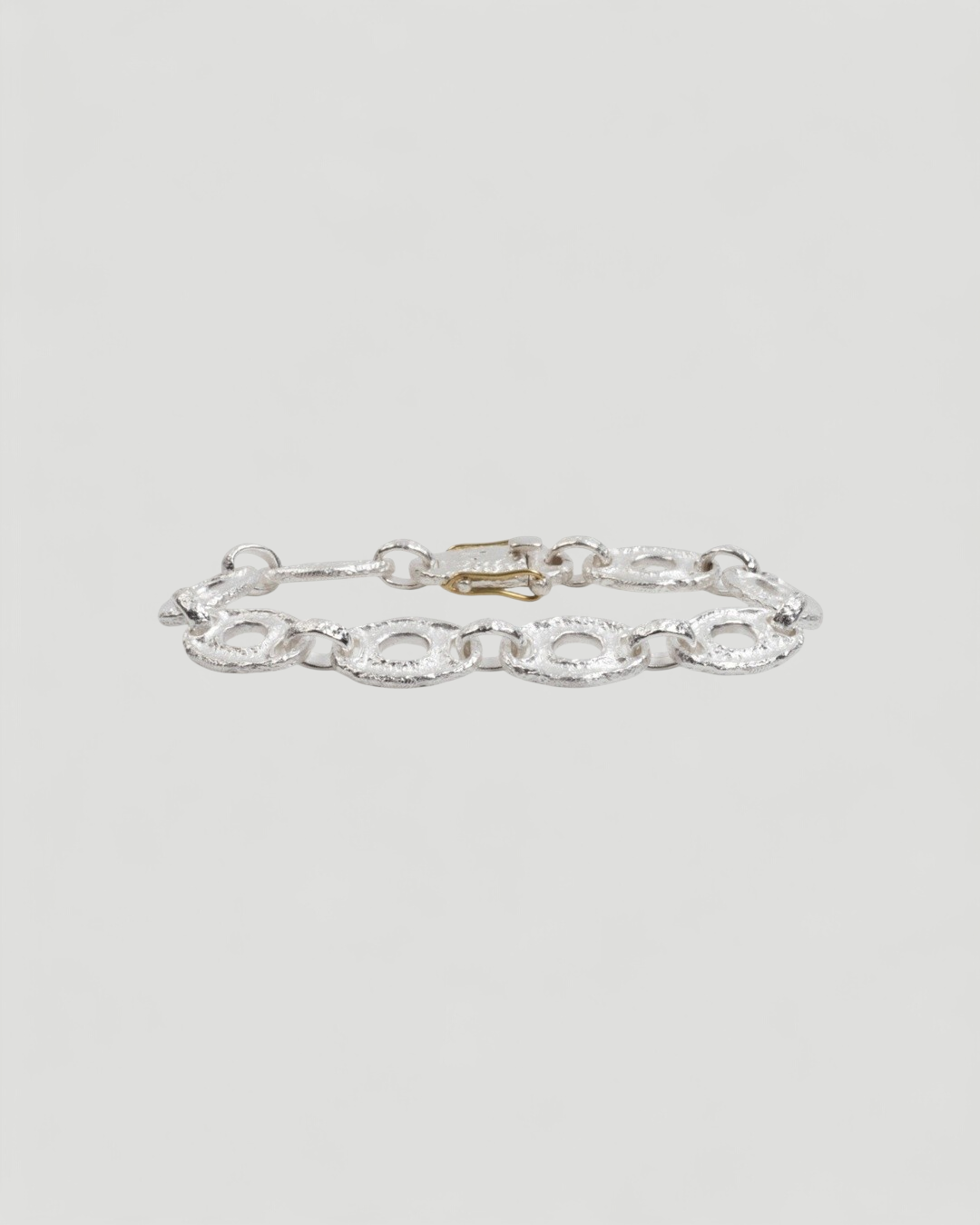 925 Silber Armband mit Nugget-Struktur und 750 Gelbgold - Goldschmiede Krack