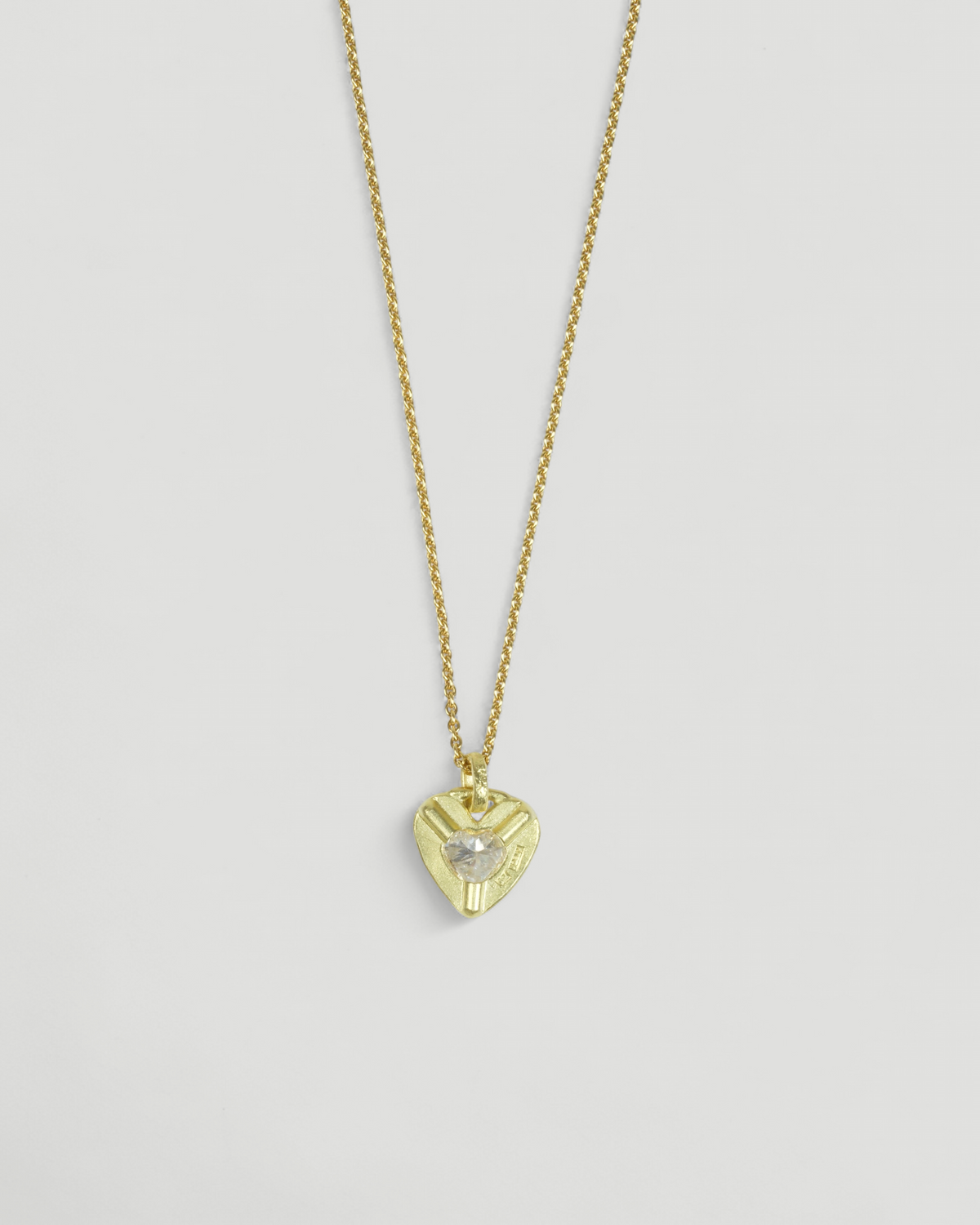 750 Gold-Herzanhänger mit LGD Diamant und 750 Goldkette, Rückseite des Goldherzens mit Nugget-Struktur