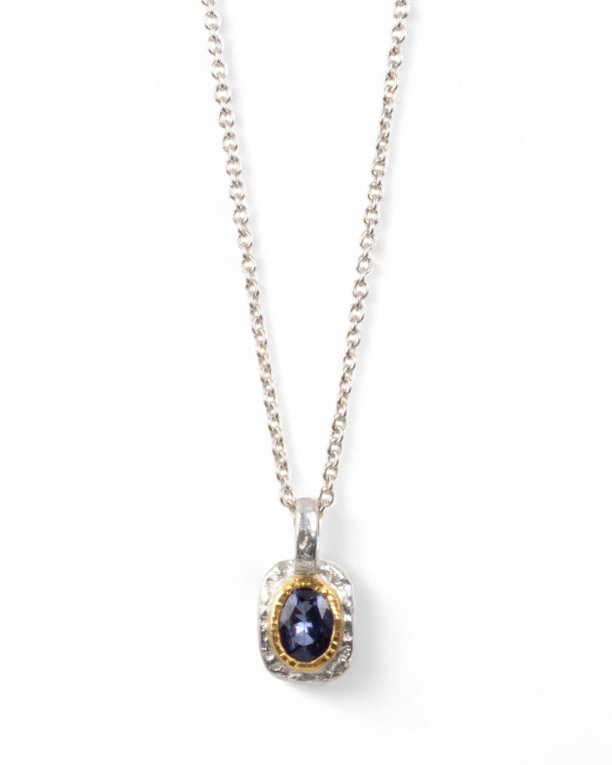 Bicolor Silberanhänger mit Tansanit (0.89 ct) in 999 Goldfassung mit 925 Silberkette - Goldschmiede Krack - Trauringe & Unikatschmuck aus Deidesheim