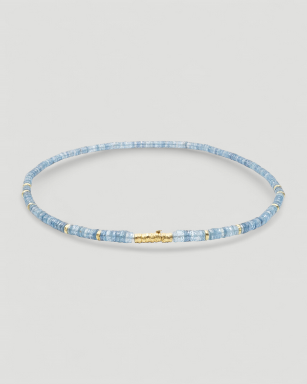 Blue aquamarine necklace with 18k gold clasp and spacers