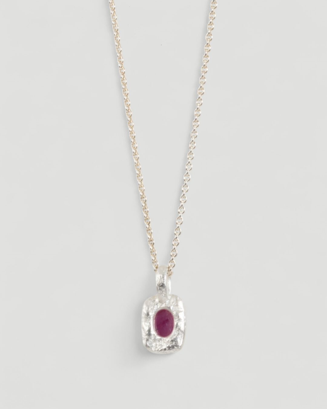 Bicolor organisch-eckiger 925 Silberanhänger mit pinken Rubin (0.80 ct) und 999 Feingold - Goldschmiede Krack