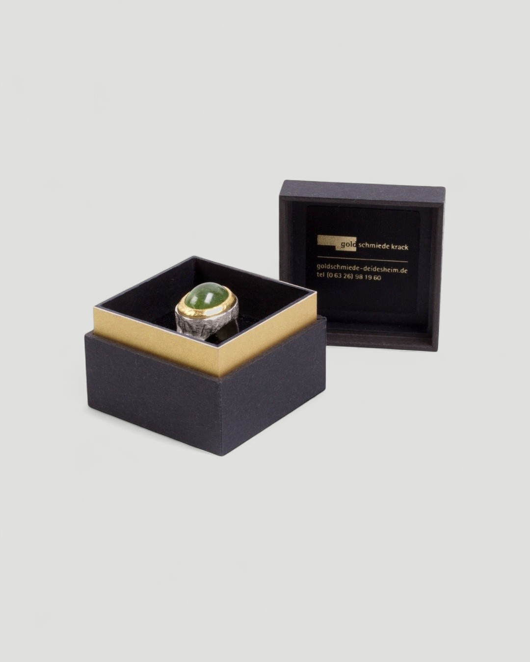 925 Silberring mit grünem Peridot (18,89 ct) und 999 Feingold-Fassung - Goldschmiede Krack