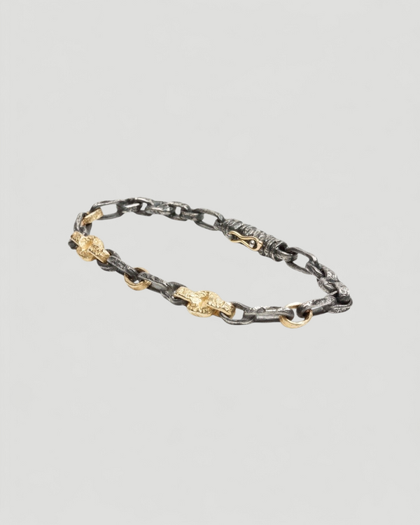 Bicolor Armband aus geschwärzten 925 Silber und 750 Gold