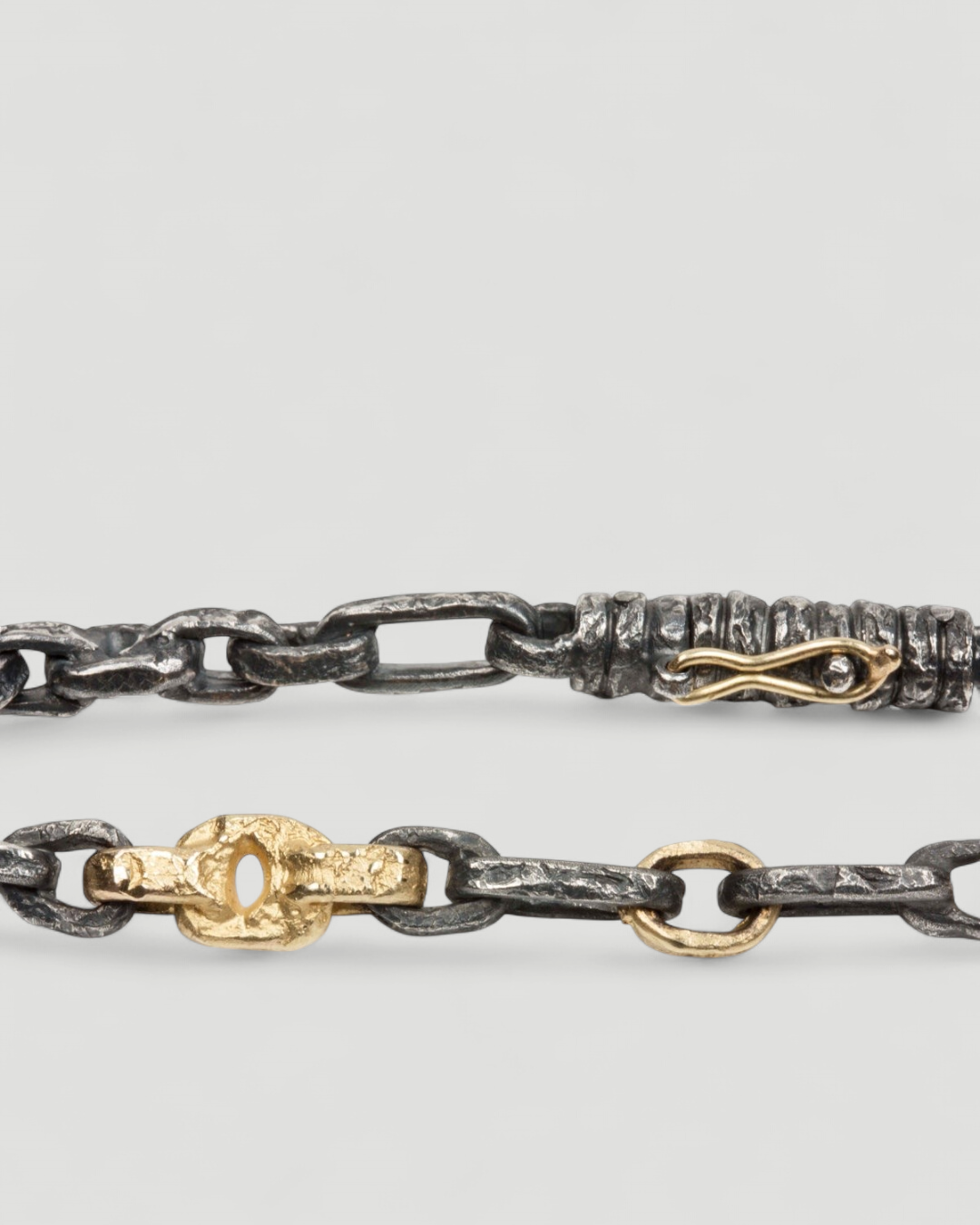 Bicolor Armband aus geschwärzten 925 Silber und 750 Gold - Goldschmiede Krack